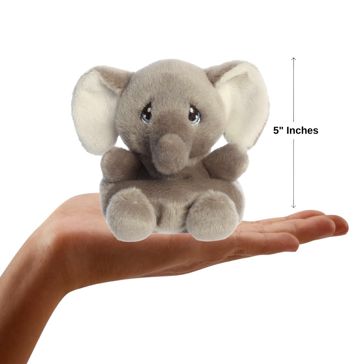 Sizing graphic for the Aurora Palm Pals Precious Moments plush showing Tuk Elephant sitting perfectly in the palm of a hand, indicating a total height of 5 inches.