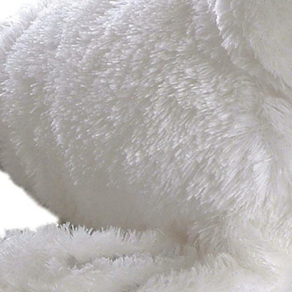 Close-up detail of the seal's white plush fur highlighting the soft, velvety texture of the material.