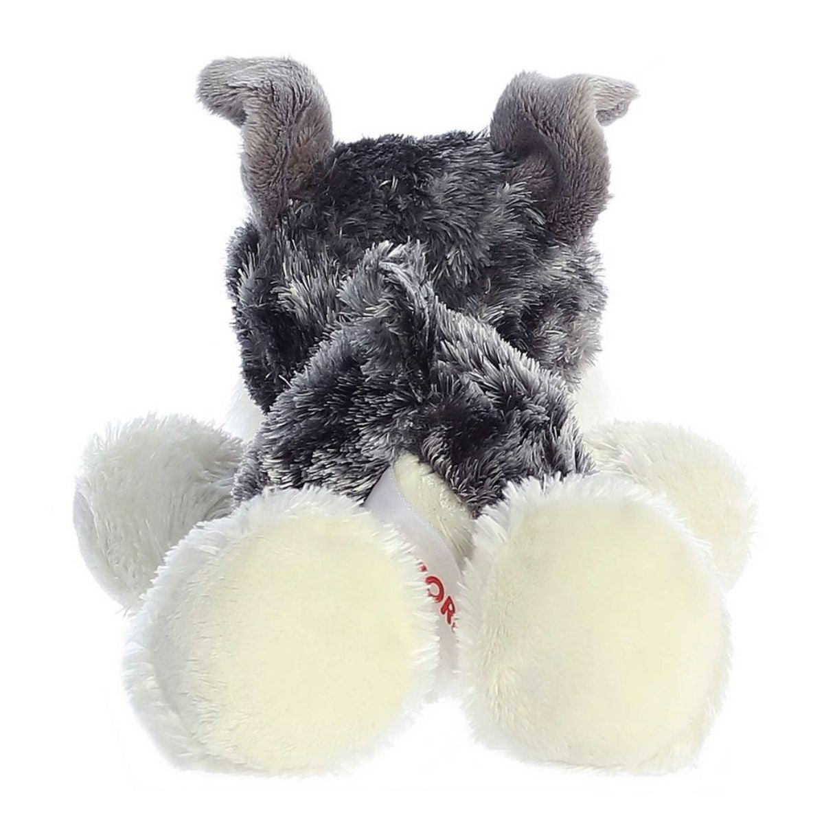 Rear view of the Stein Schnauzer plush showing its textured grey back and soft white paws.