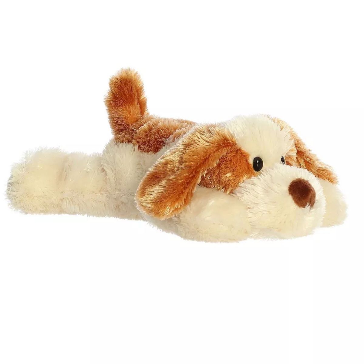 Angled side view of the Aurora Mini Flopsie Scruff Puppy 8-inch plush resting on its belly, featuring brown and cream patched fur and floppy ears.