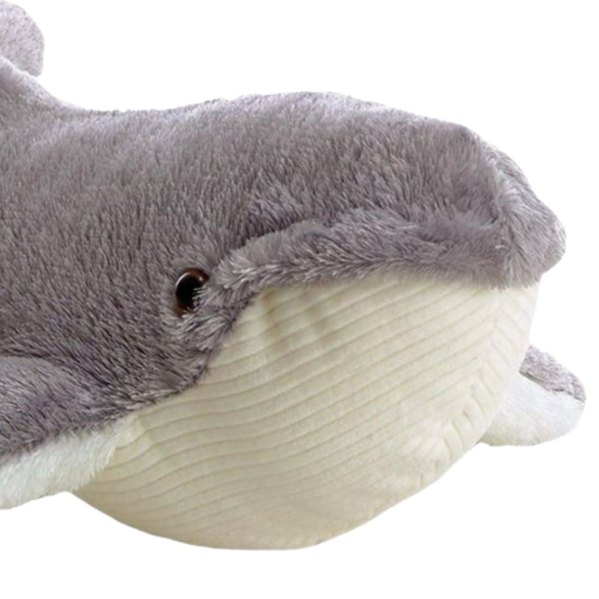 Close-up angled view of the soft whale plush highlighting its textured ribbed belly and dark eye.