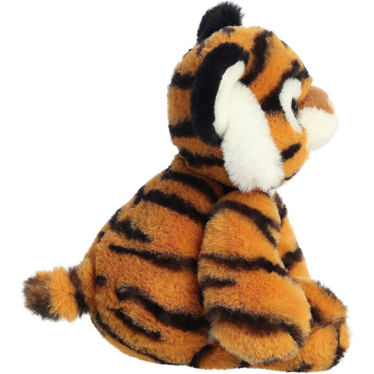 Side profile view of the soft Topaz Tiger plush sitting up, showing its striped back and small tail.
