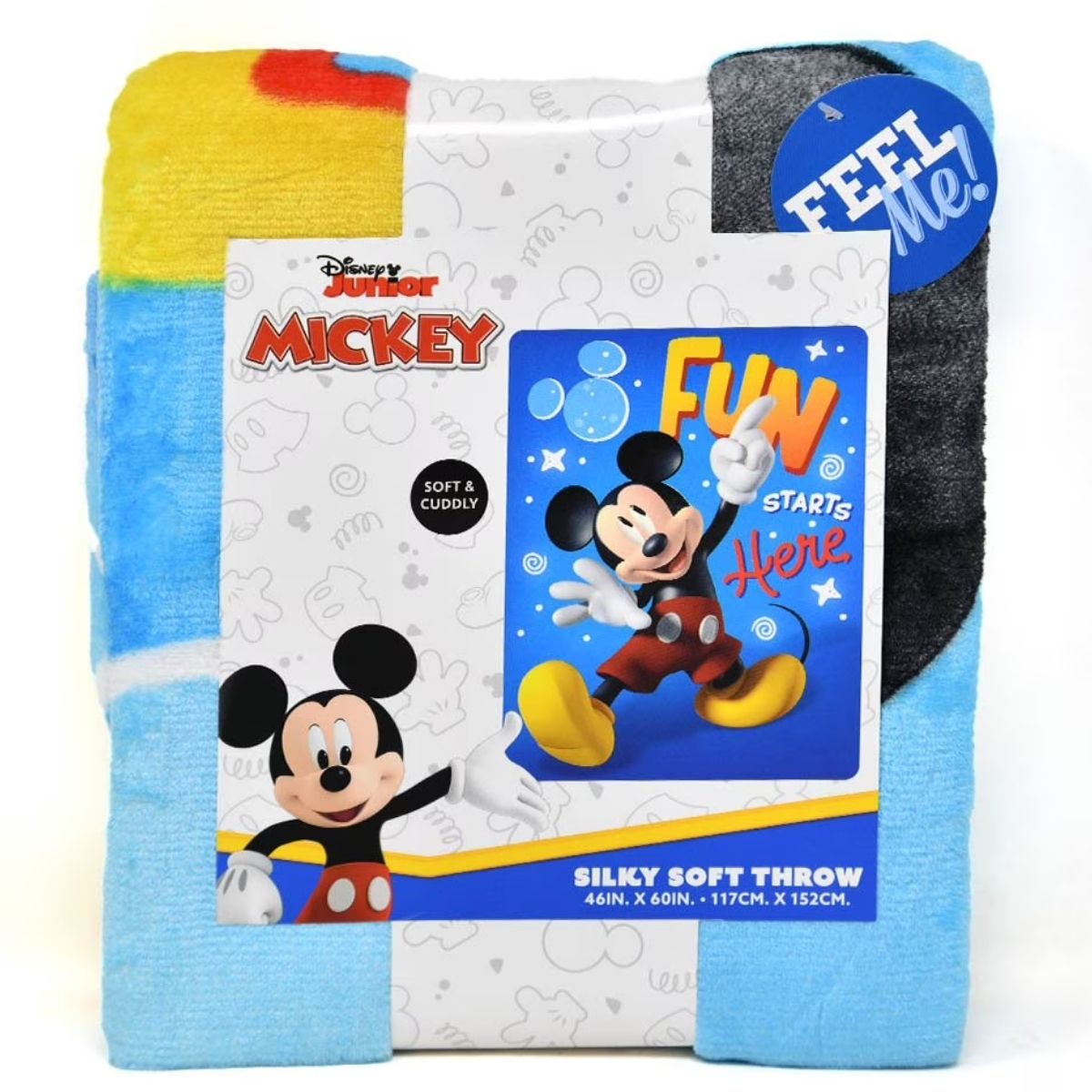 Lifestyle bedroom shot showing the Mickey Mouse 'Fun Starts Here' blanket draped beautifully over a child's bed.