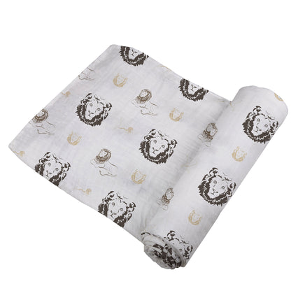 Close-up of the breathable bamboo muslin fabric weave showing the Hear Me Roar lion design.