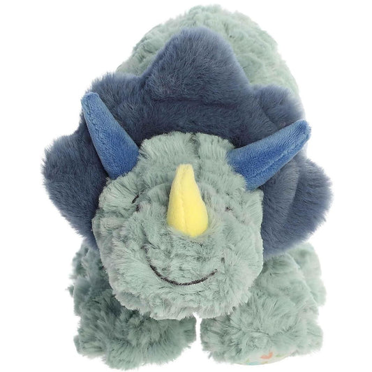 Straight front view of the green Triceratops plush standing on four legs, showing her friendly embroidered smile and soft horns.