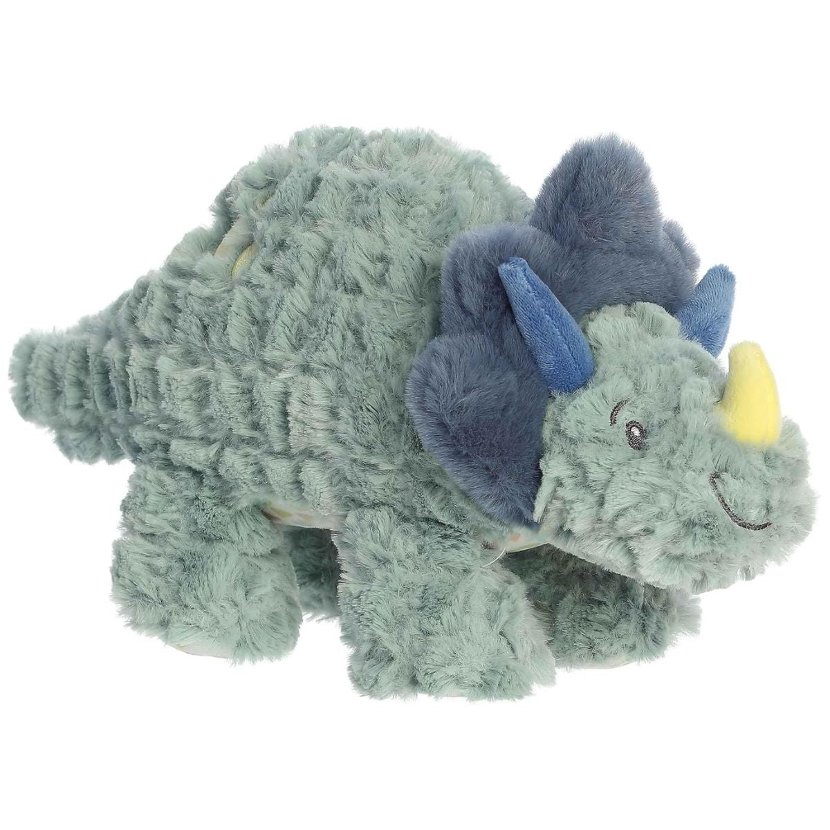 Angled front view of the 12-inch Aurora Softiesaurus Traci Triceratops plush featuring shaggy sage green fur, a navy blue frill, and yellow horns.