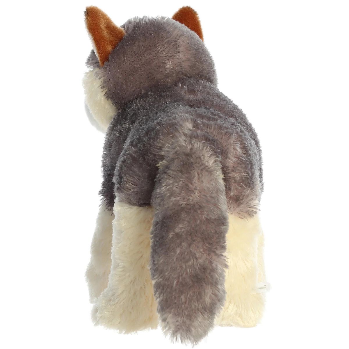 Direct back view of the wolf plush highlighting its thick grey tail and back legs.