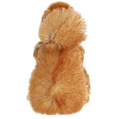 Rear view of the Nutsie Squirrel plush focusing on its soft, rounded back and large fluffy reddish-brown tail.