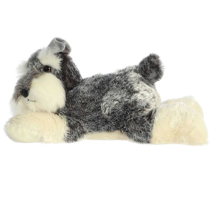Side profile view of the grey Schnauzer plush showing its lounging posture, perky ears, and short upright tail.