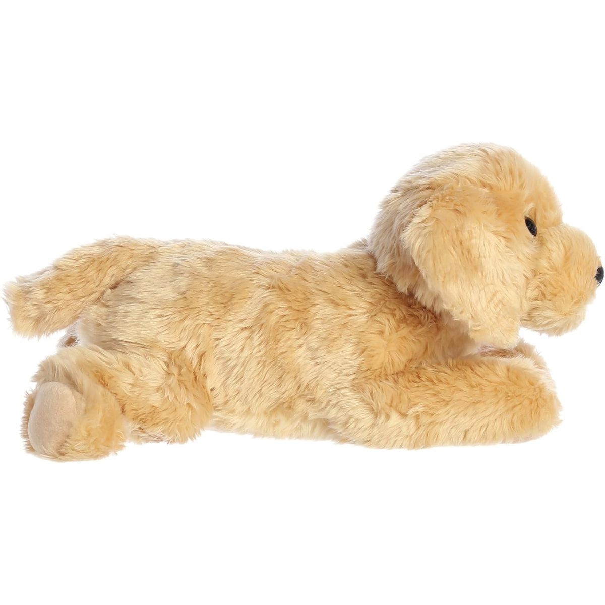 Side profile view of the cuddly Goldie dog stuffed animal resting comfortably on her tummy.