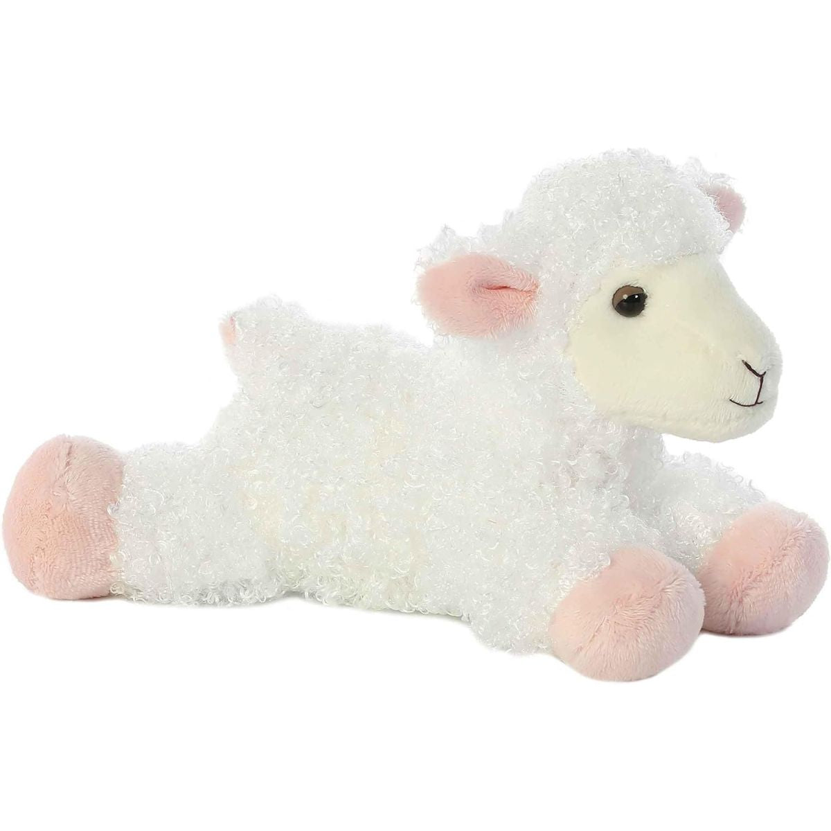 Angled front view of the 8-inch Aurora Mini Flopsie Lana the Lamb plush toy laying down, featuring fluffy white fleece and pastel pink hooves.