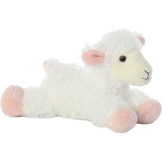 Angled front view of the 8-inch Aurora Mini Flopsie Lana the Lamb plush toy laying down, featuring fluffy white fleece and pastel pink hooves.