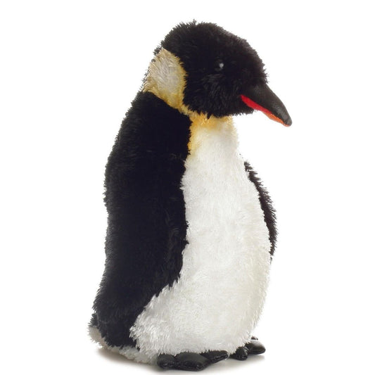 Angled front view of the 8-inch Aurora Mini Flopsie Emperor Penguin stuffed animal standing upright, showing its black and white body and yellow neck accents.
