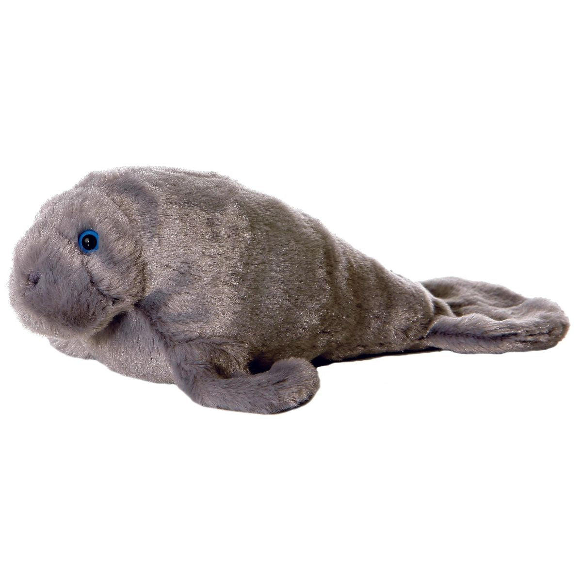 Side view of the Aurora Mini Flopsie Manny the Manatee 8-inch plush resting on its belly, featuring textured grey fur and blue eyes.