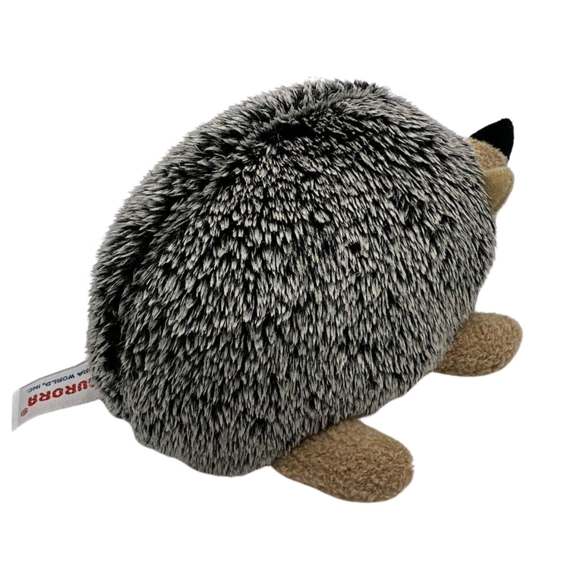 Rear view of the Howie Hedgehog plush showing its rounded back and small tan paws.