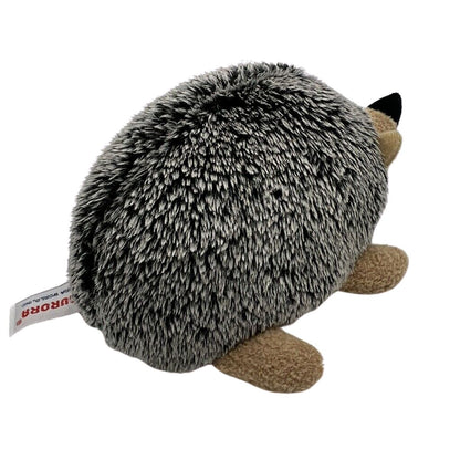 Rear view of the Howie Hedgehog plush showing its rounded back and small tan paws.