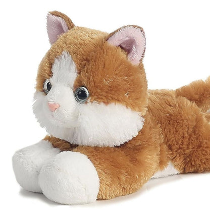 Close-up front view of the soft Sunshine Tabby cat plush showing its white muzzle, pink nose, and dark eyes.
