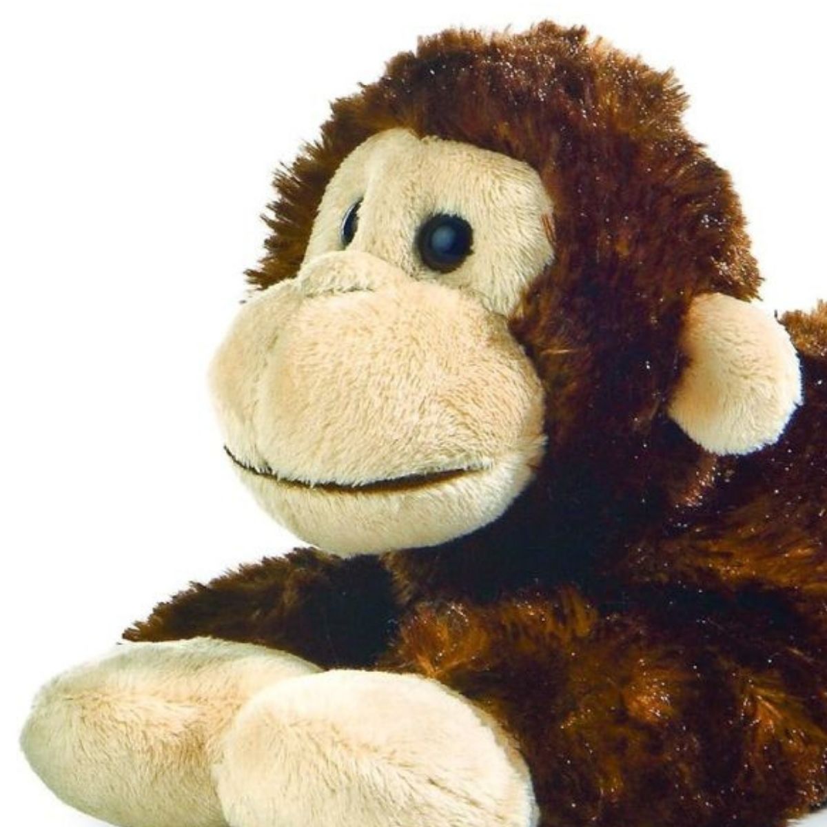 Close-up front angle of the chimpanzee monkey stuffed animal highlighting its tan face, round ears, and stitched smile.