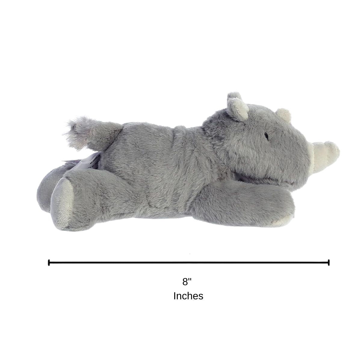 Side profile view of the Aurora Mini Flopsie rhinoceros plush with a dimension line indicating its 8-inch length.