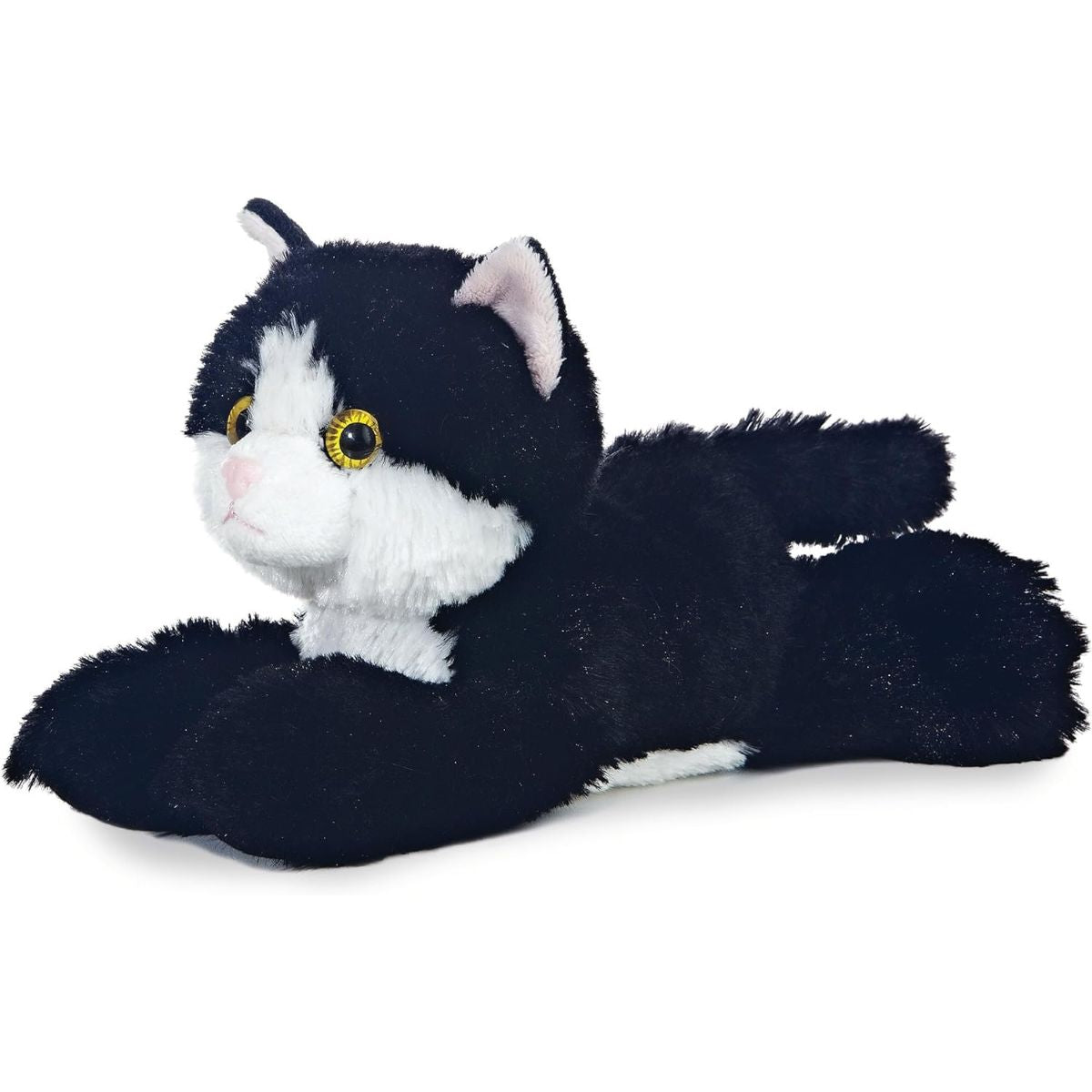 Angled side view of the Aurora Mini Flopsie Maynard Kitten 8-inch plush resting on its belly, featuring black and white tuxedo fur.