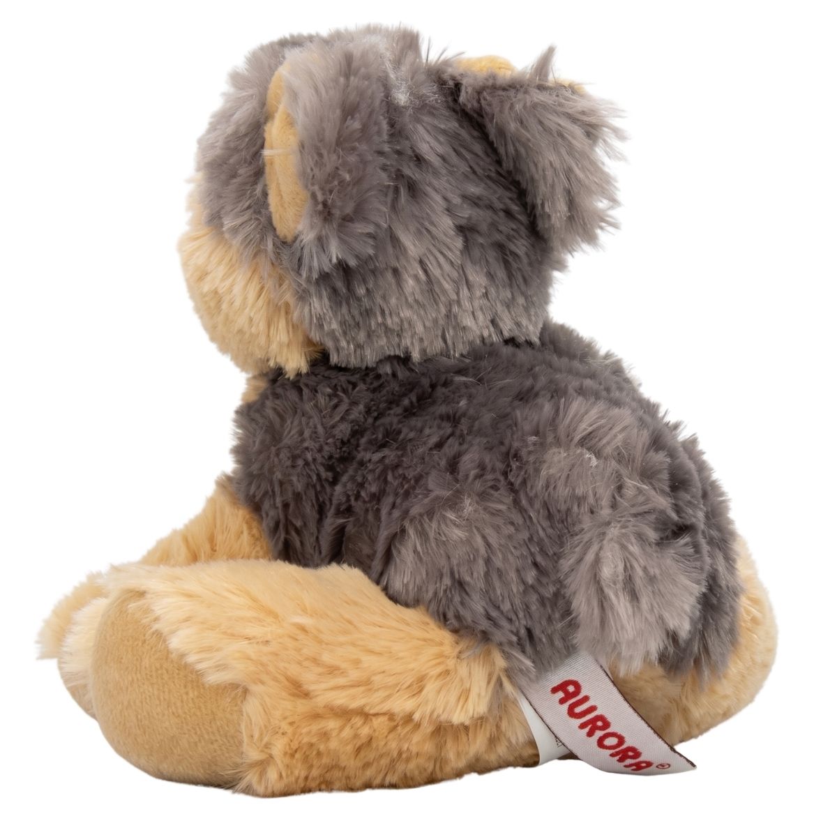 Rear view of the Yorkshire Terrier stuffed animal showing its textured steel-grey back, tan hind legs, and a small upright tail.