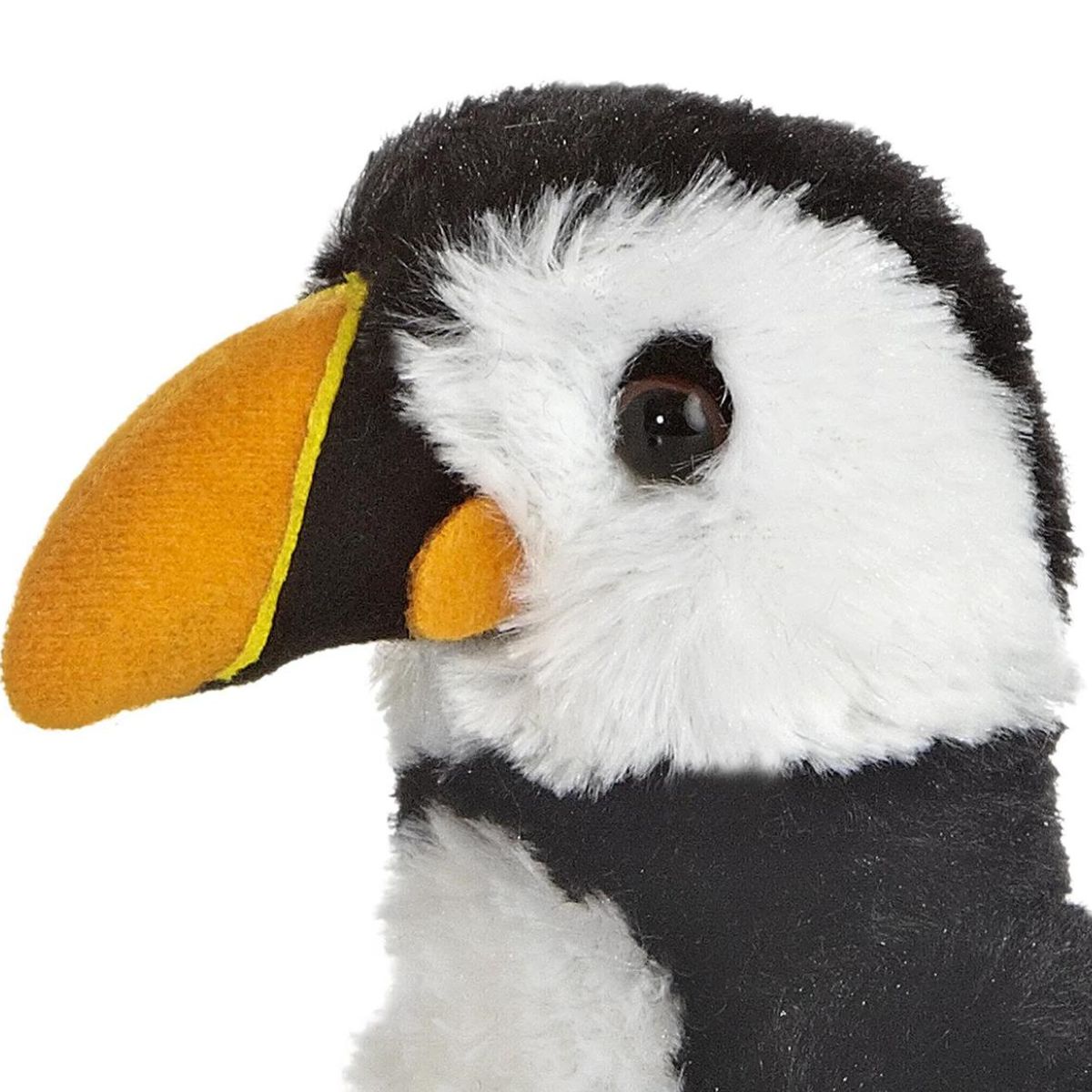 Close-up view of the puffin stuffed animal highlighting its sweet face, dark eyes, and distinctive orange and yellow beak.