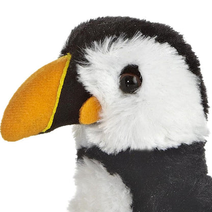 Close-up view of the puffin stuffed animal highlighting its sweet face, dark eyes, and distinctive orange and yellow beak.