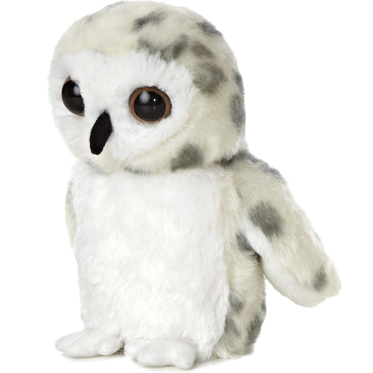 Three-quarter angled view of the snowy owl stuffed animal showing its detailed white and grey spotted plumage and folded wings.