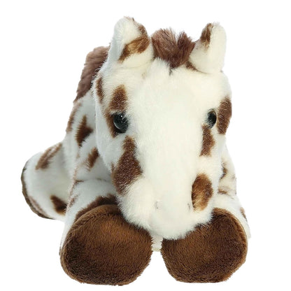 Straight-on front view of the soft Mini Flopsie spotted horse plush showing its face and dark brown hooves.