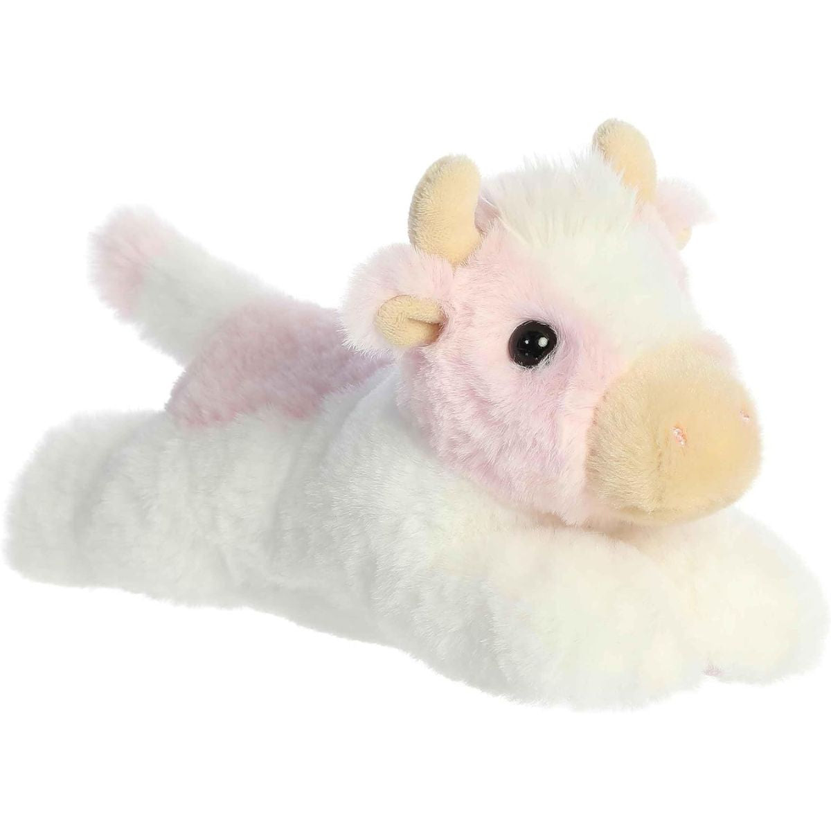 Angled side view of the Aurora Mini Flopsie Sadie Strawberry Cow 8-inch plush resting on its belly, featuring white fur and pink patches.