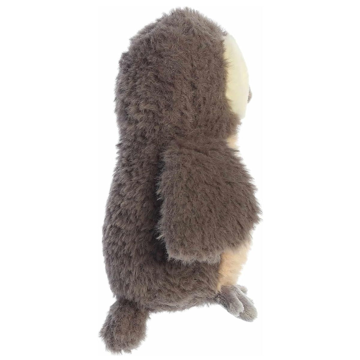 Side profile view of the adorable Aurora Owlet stuffed animal highlighting its fluffy brown back and little grey feet.