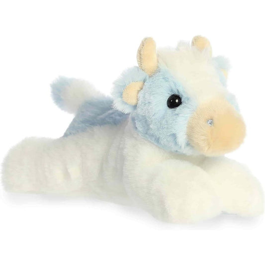 Aurora 8-inch Mini Flopsie Billie Blueberry Cow plush toy resting on its belly, featuring soft white fur, light blue patches, tan muzzle, and beige horns.