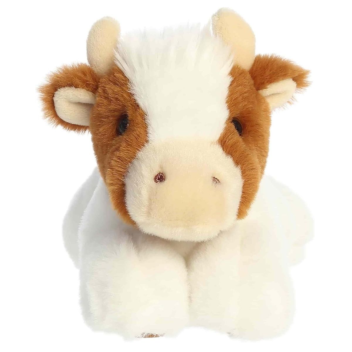 Front face view of the adorable Aurora Grazy Guernsey Cow stuffed animal resting on its front hooves, featuring sweet dark eyes and a soft tan snout.
