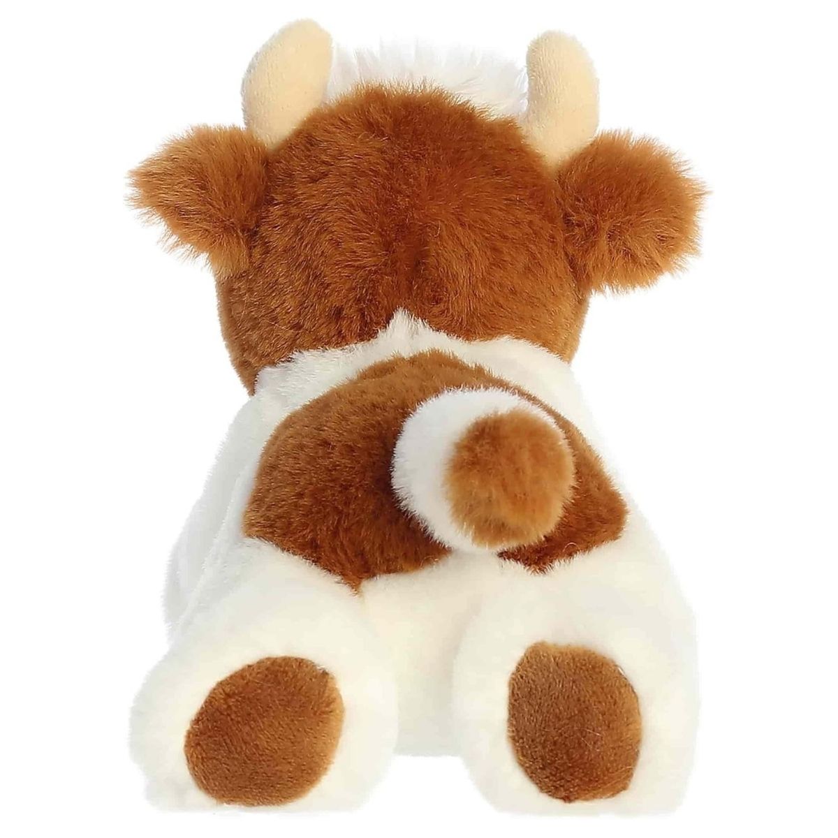 Back view of the Aurora Flopsie cow plush toy showing its brown and white back, brown hind hooves, and a little tail.