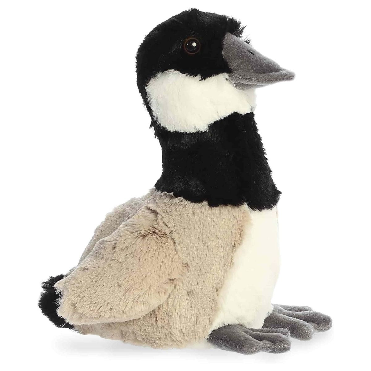 Angled side view of the Aurora Flopsie 8-inch Honks Canadian Goose plush resting, showing its black neck, white cheek patches, and tan body.