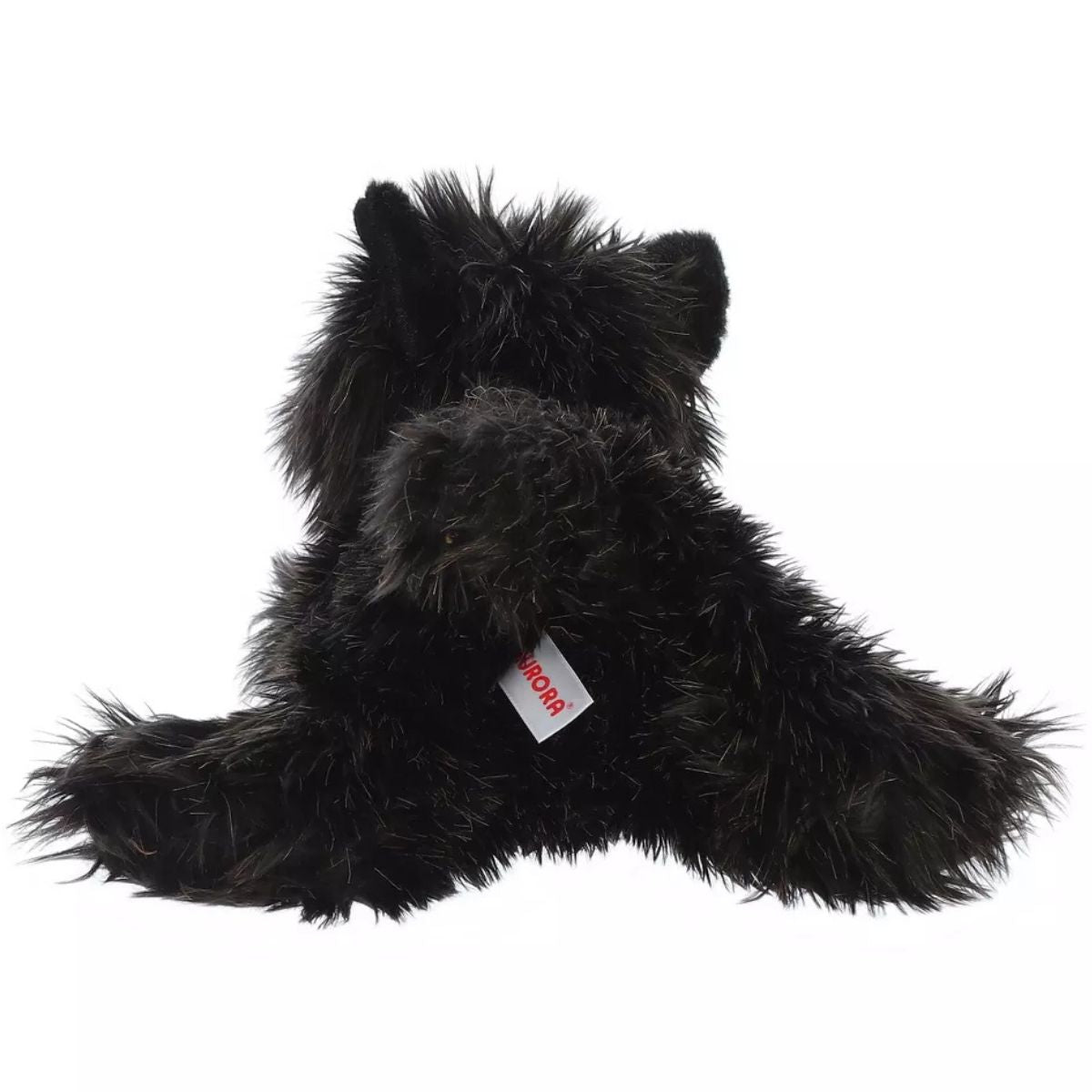 Back view of the cuddly Flopsie terrier stuffed animal showing its textured black back and hind paws.