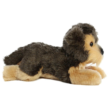 Side profile view of the Yorkie dog stuffed animal highlighting its lounging posture and soft tan paws.