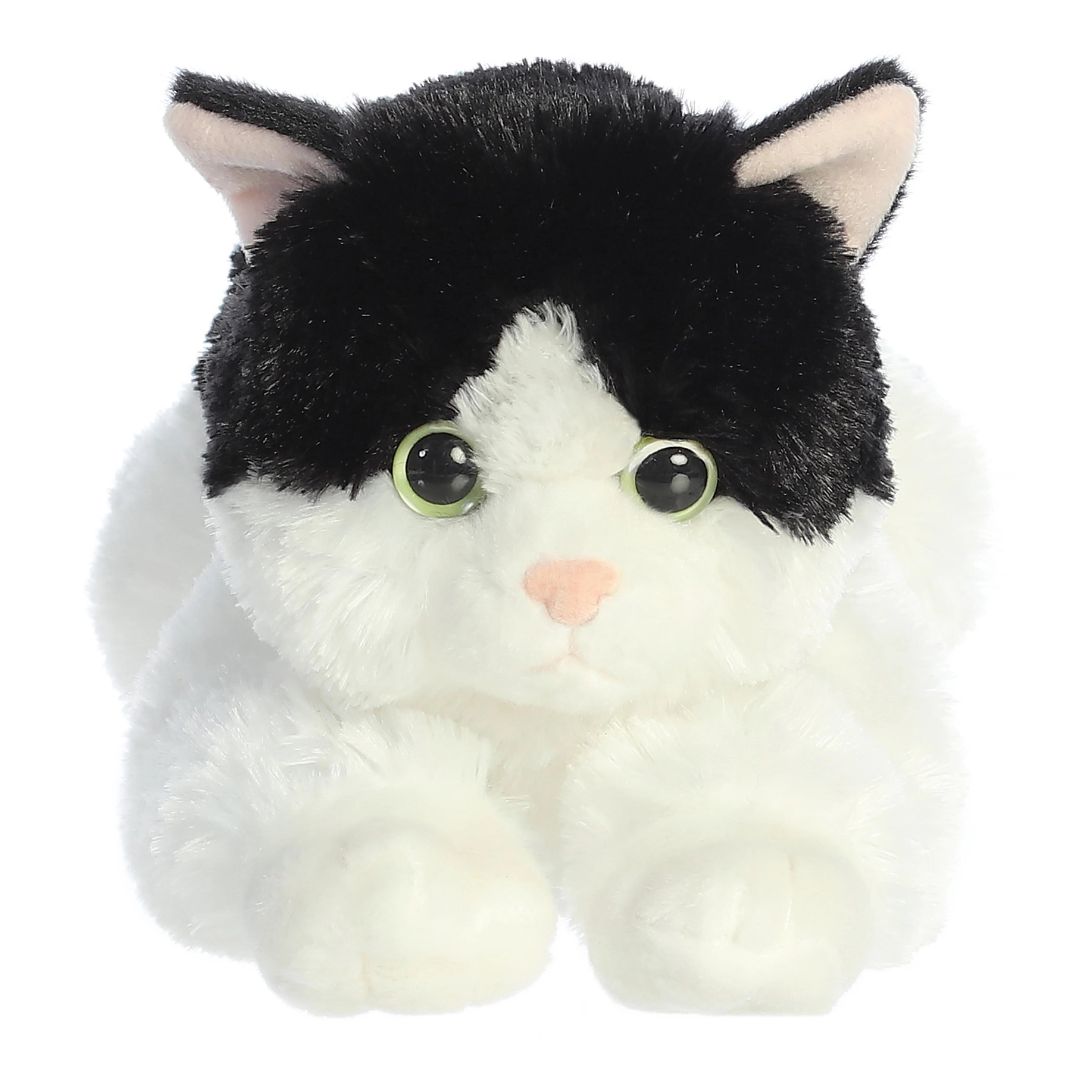 Straight-on front view of the soft black and white cat plush showing her white muzzle, pink nose, and bright eyes.