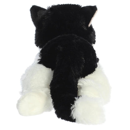 Direct back view of the tuxedo cat plush highlighting her black tail with a white tip and white hind paws.