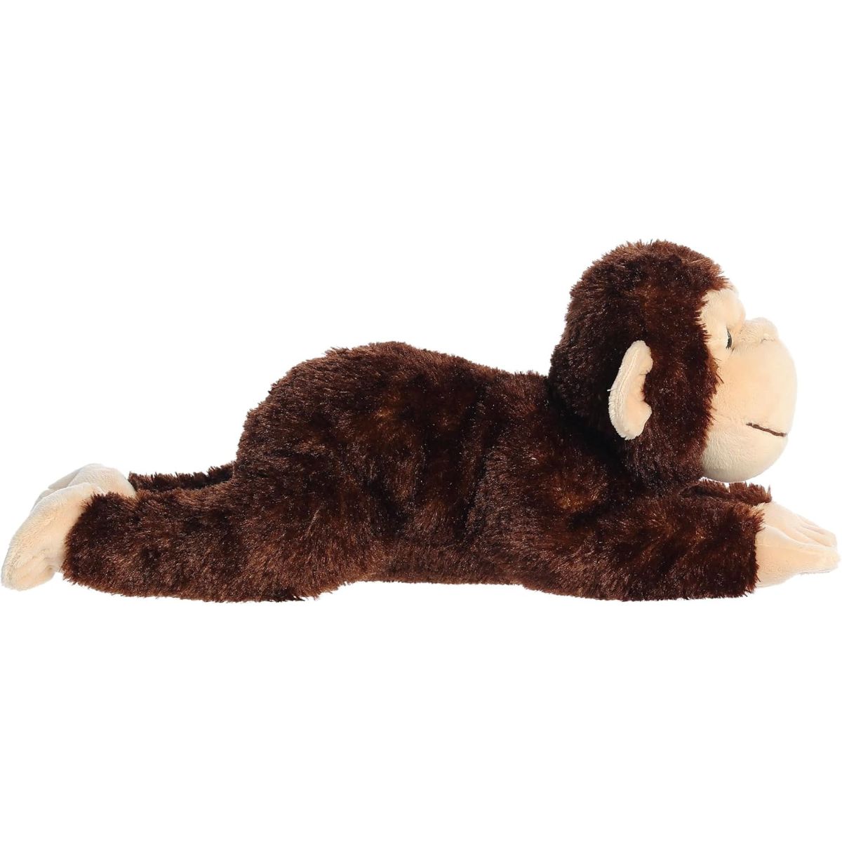Side profile view of the brown chimp plush showing its lounging posture and outstretched arms.