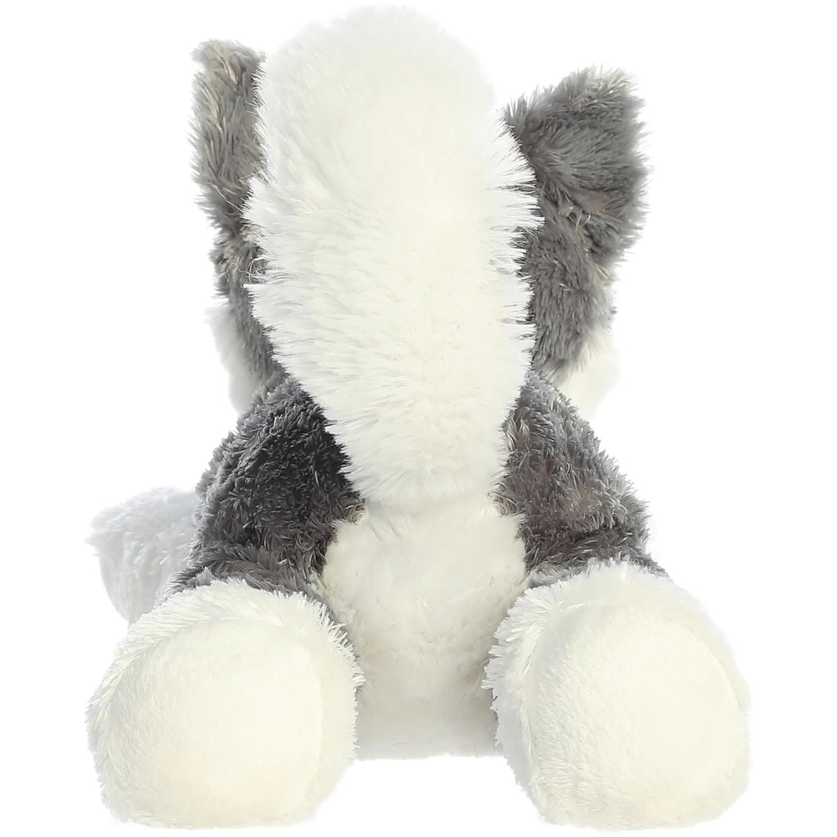 Direct back view of the dog plush highlighting his fluffy white and grey tail and the bottoms of his hind paws.