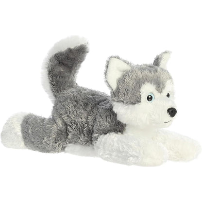 Angled front view of the 12-inch Aurora Flopsie Shadow Siberian Husky stuffed animal lying down, showing his grey and white fur and perky tail.