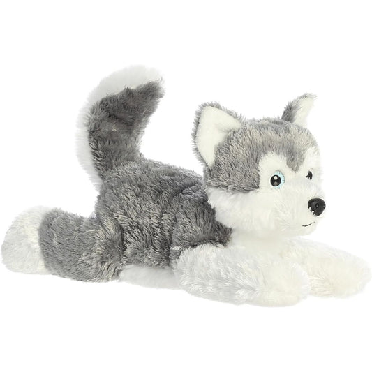 Angled front view of the 12-inch Aurora Flopsie Shadow Siberian Husky stuffed animal lying down, showing his grey and white fur and perky tail.