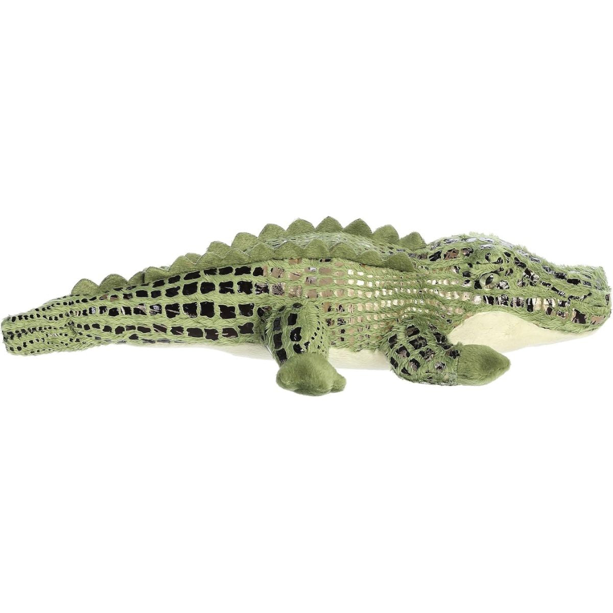 Side profile view of the green alligator plush showing its lounging posture, long textured tail, and lighter underbelly.