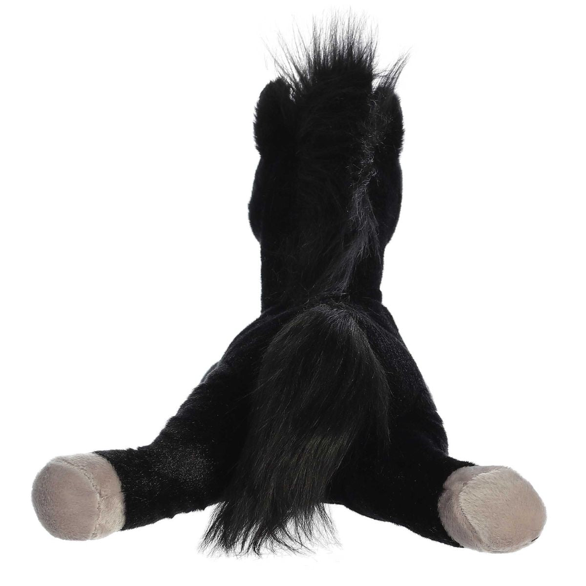 Rear view of the Blackjack Horse plush showing its black back, fluffy black tail, and sprawling back legs with light hooves.