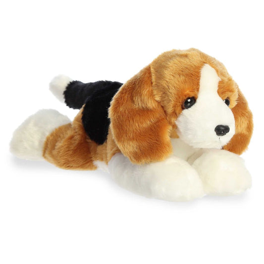 Angled front view of the Aurora Flopsie Buddy the Beagle 12-inch plush resting on its belly, featuring a tan, white, and black tri-color coat.