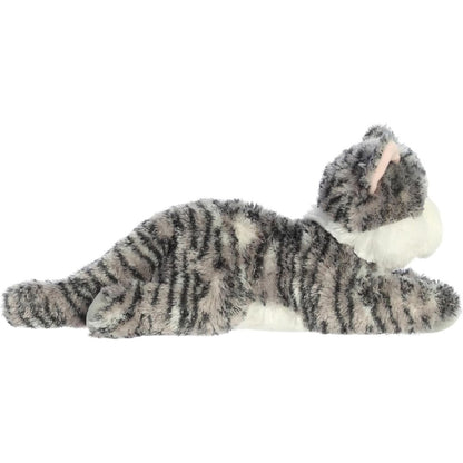Side profile view of the cuddly Lily cat stuffed animal resting comfortably on her tummy.