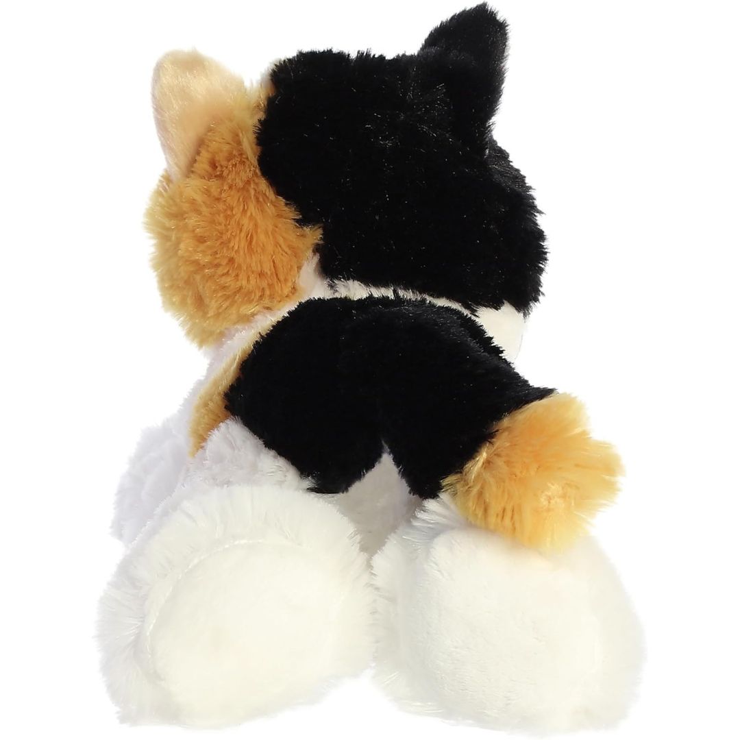 Direct back view of the cat stuffed animal highlighting her black and orange back patches and tail.