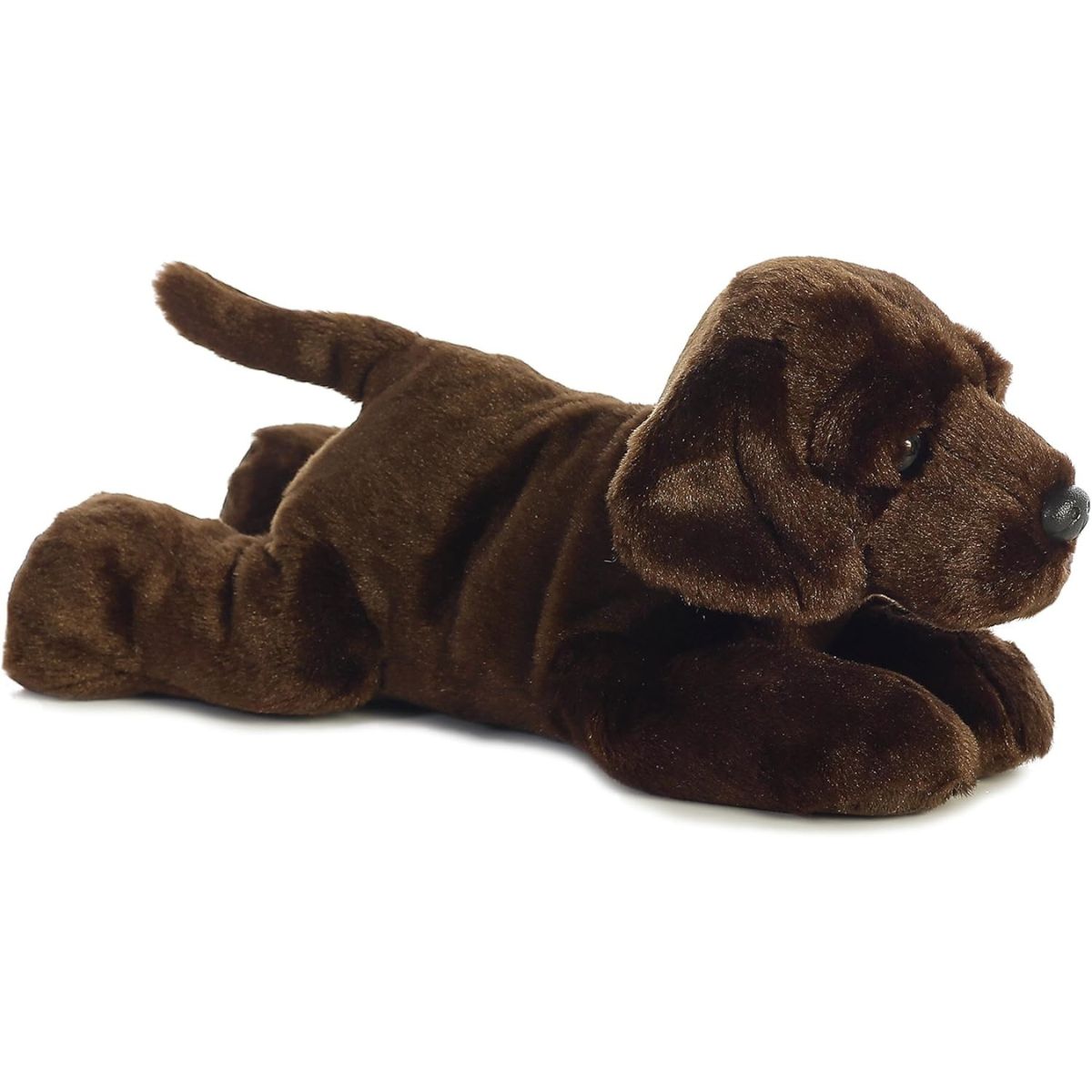 Side profile view of the cuddly Max dog stuffed animal resting comfortably on his tummy.