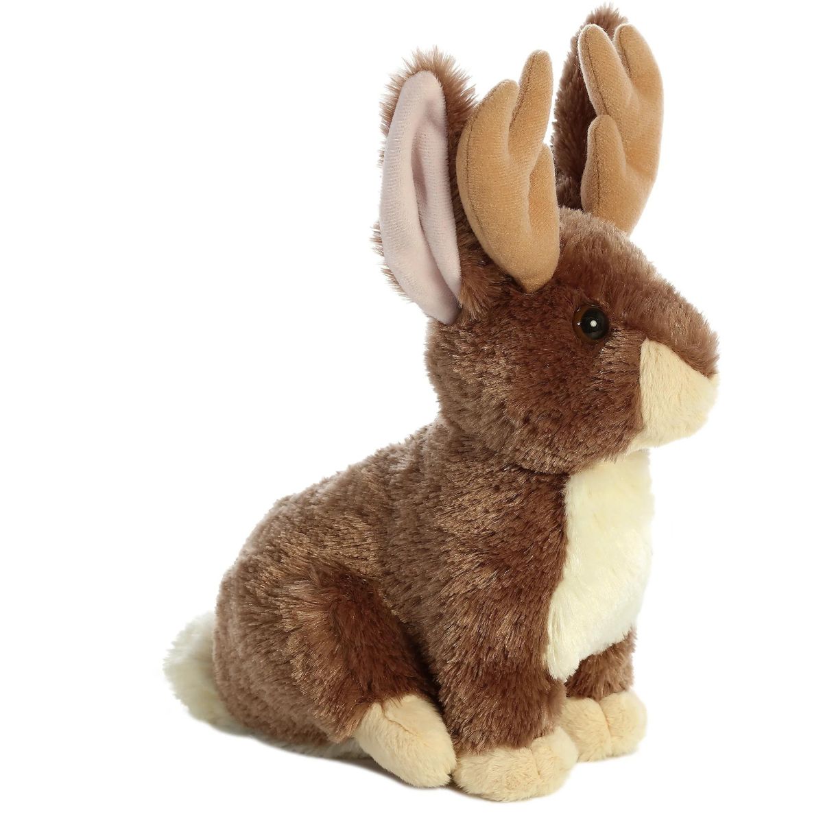 Side profile view of the cuddly Jack-A-Lope stuffed animal showing its little white tail and upright sitting pose.